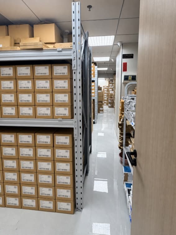 Labelled component storage shelving in the stock area